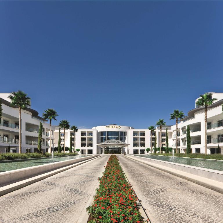 https://golftravelpeople.com/wp-content/uploads/2019/04/Conrad-Algarve-Hotel-2.jpg