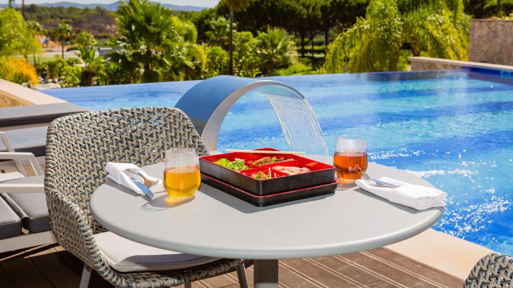 https://golftravelpeople.com/wp-content/uploads/2019/04/Conrad-Algarve-Hotel-Restaurants-and-Bars-6.jpg