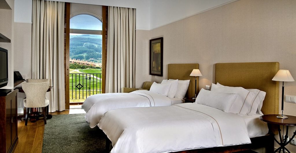 https://golftravelpeople.com/wp-content/uploads/2019/04/Dolce-Campo-Real-Resort-twin-superior-deluxe-bedroom-1024x529.jpg