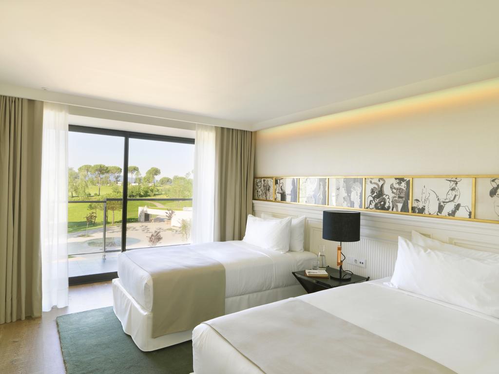 https://golftravelpeople.com/wp-content/uploads/2019/04/Hotel-Camiral-at-PGA-Catalunya-Resort-Bedrooms-6.jpg