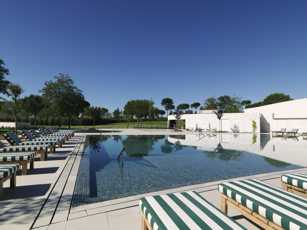 https://golftravelpeople.com/wp-content/uploads/2019/04/Hotel-Camiral-at-PGA-Catalunya-Resort-Swimming-Pools-4.jpg