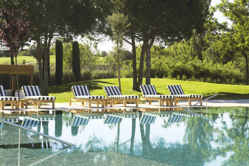 https://golftravelpeople.com/wp-content/uploads/2019/04/Hotel-Camiral-at-PGA-Catalunya-Resort-Swimming-Pools-5.jpg