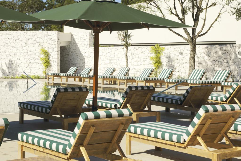 https://golftravelpeople.com/wp-content/uploads/2019/04/Hotel-Camiral-at-PGA-Catalunya-Resort-Swimming-Pools-6.jpg