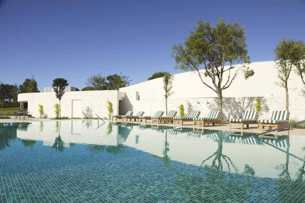 https://golftravelpeople.com/wp-content/uploads/2019/04/Hotel-Camiral-at-PGA-Catalunya-Resort-Swimming-Pools-7.jpg