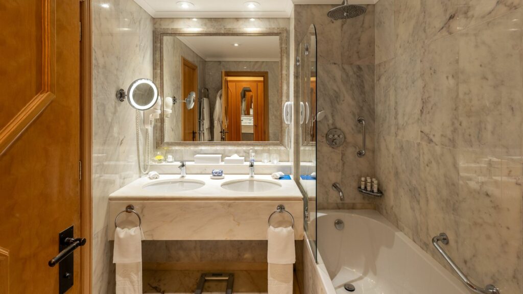 https://golftravelpeople.com/wp-content/uploads/2019/04/Hotel-Quinta-do-Lago-Algarve-Portugal-Bedrooms-and-Suites-2-1024x576.jpg