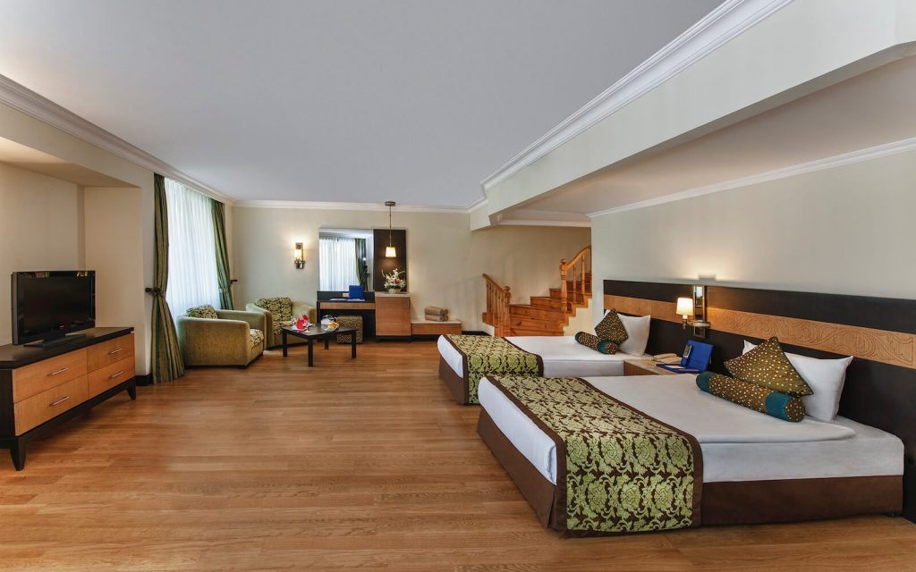 https://golftravelpeople.com/wp-content/uploads/2019/04/Sirene-Belek-Hotel-Bedrooms-and-Suites-1-1024x640.jpg