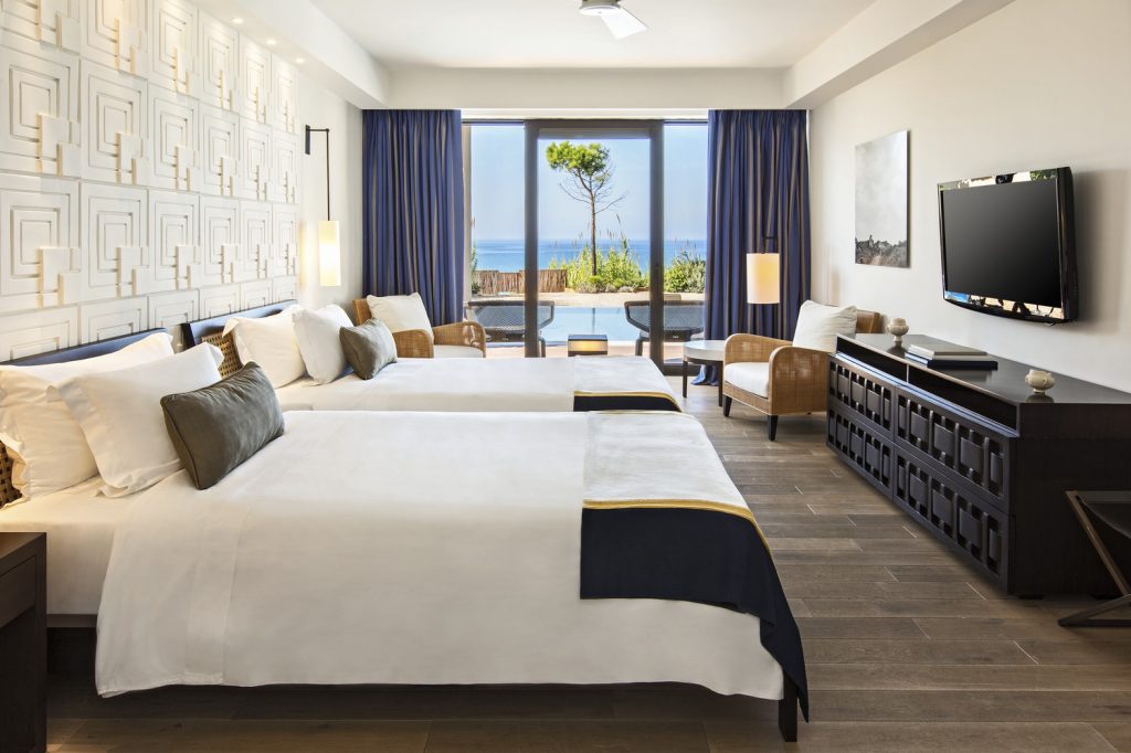 https://golftravelpeople.com/wp-content/uploads/2019/04/The-Romanos-Luxury-Collection-Resort-at-Costa-Navarino-Ambassador-Villas-Ithomi-Sapientza-Twin-Bedroom-1024x682.jpg