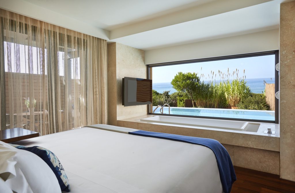 https://golftravelpeople.com/wp-content/uploads/2019/04/The-Romanos-Luxury-Collection-Resort-at-Costa-Navarino-Grand-Infinity-Suite-Sea-Bedroom-1024x672.jpg