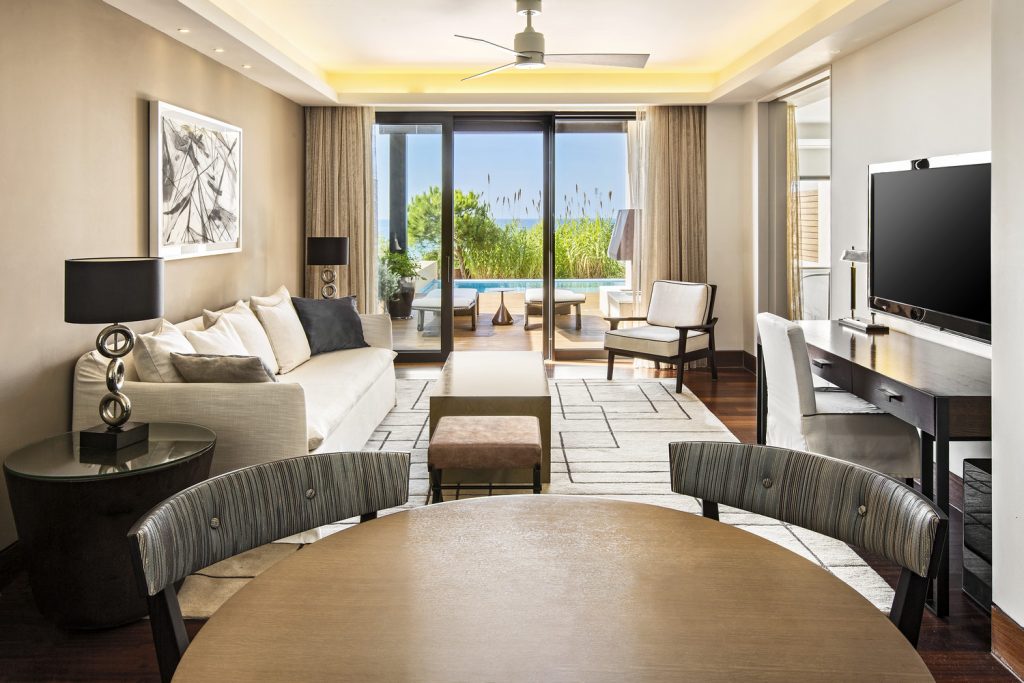 https://golftravelpeople.com/wp-content/uploads/2019/04/The-Romanos-Luxury-Collection-Resort-at-Costa-Navarino-Grand-Infinity-Suite-Sea-Living-Room-1024x683.jpg