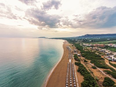 https://golftravelpeople.com/wp-content/uploads/2019/04/The-Romanos-Luxury-Collection-Resort-at-Costa-Navarino-The-Dunes-Beach-400x300.jpg
