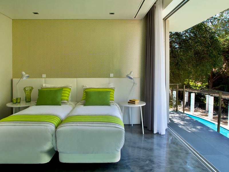 https://golftravelpeople.com/wp-content/uploads/2019/05/Casa-Vela-Guesthouse-Cascais-Bedrooms-15.jpg