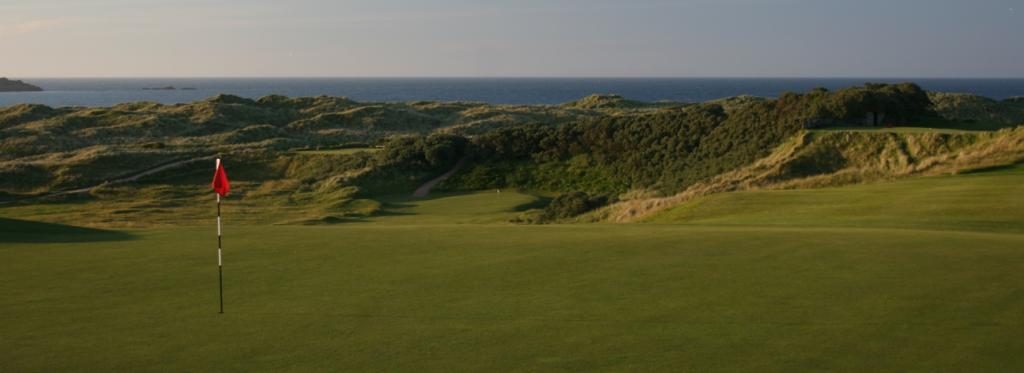 https://golftravelpeople.com/wp-content/uploads/2019/07/Royal-Portrush-Golf-Club-Dunluce-Links-Northern-Ireland-8-1024x373.jpg