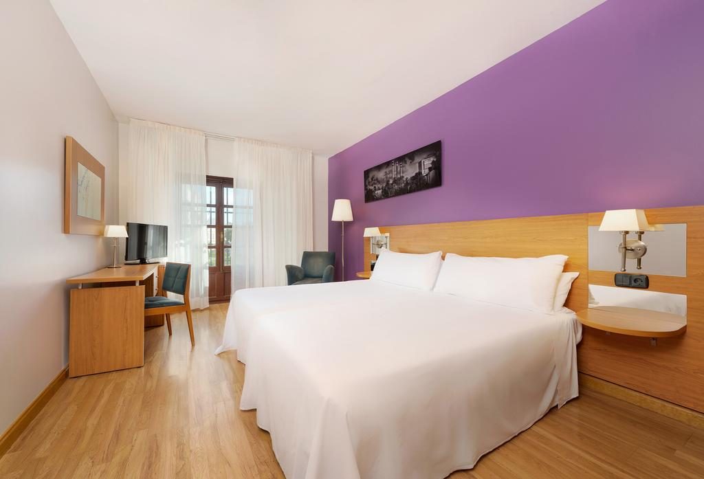 https://golftravelpeople.com/wp-content/uploads/2019/12/Tryp-Jerez-Hotel-Bedrooms-8-Copy-1024x697.jpg