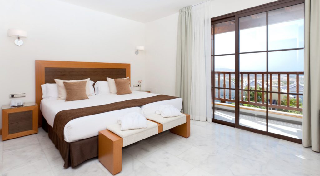 https://golftravelpeople.com/wp-content/uploads/2020/09/Hotel-Suite-Villa-Maria-Costa-Adeje-Tenerife-1-bedroom-villas-2-1024x564.jpg