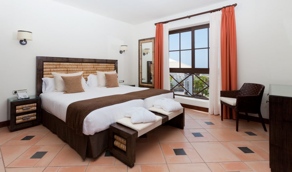 https://golftravelpeople.com/wp-content/uploads/2020/09/Hotel-Suite-Villa-Maria-Costa-Adeje-Tenerife-2-bedroom-villas-6-1024x606.jpg