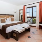 https://golftravelpeople.com/wp-content/uploads/2020/09/Hotel-Suite-Villa-Maria-Costa-Adeje-Tenerife-2-bedroom-villas-6-150x150.jpg
