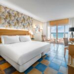 https://golftravelpeople.com/wp-content/uploads/2020/11/Elba-Sara-Beach-Golf-Resort-Fuerteventura-Bedrooms-and-Suites-11-150x150.jpg