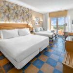 https://golftravelpeople.com/wp-content/uploads/2020/11/Elba-Sara-Beach-Golf-Resort-Fuerteventura-Bedrooms-and-Suites-12-150x150.jpg