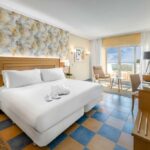 https://golftravelpeople.com/wp-content/uploads/2020/11/Elba-Sara-Beach-Golf-Resort-Fuerteventura-Bedrooms-and-Suites-15-150x150.jpg