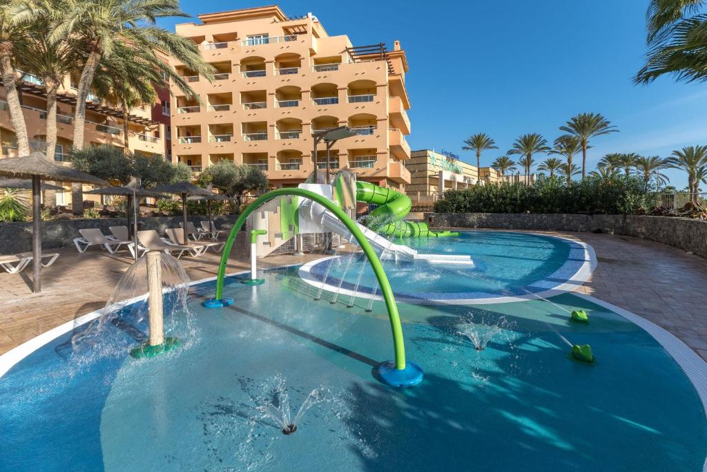 https://golftravelpeople.com/wp-content/uploads/2020/11/Elba-Sara-Beach-Golf-Resort-Fuerteventura-Swimming-Pools-and-Leisure-Facilities-7.jpg
