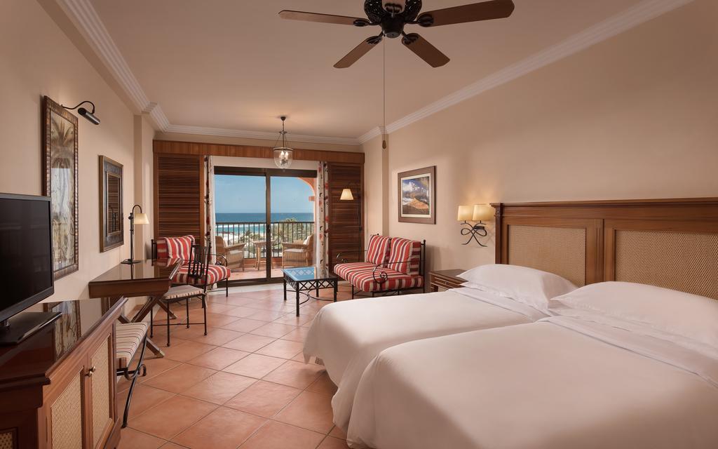 https://golftravelpeople.com/wp-content/uploads/2020/11/Sheraton-Fuerteventura-Golf-Spa-Resort-Bedrooms-7.jpg