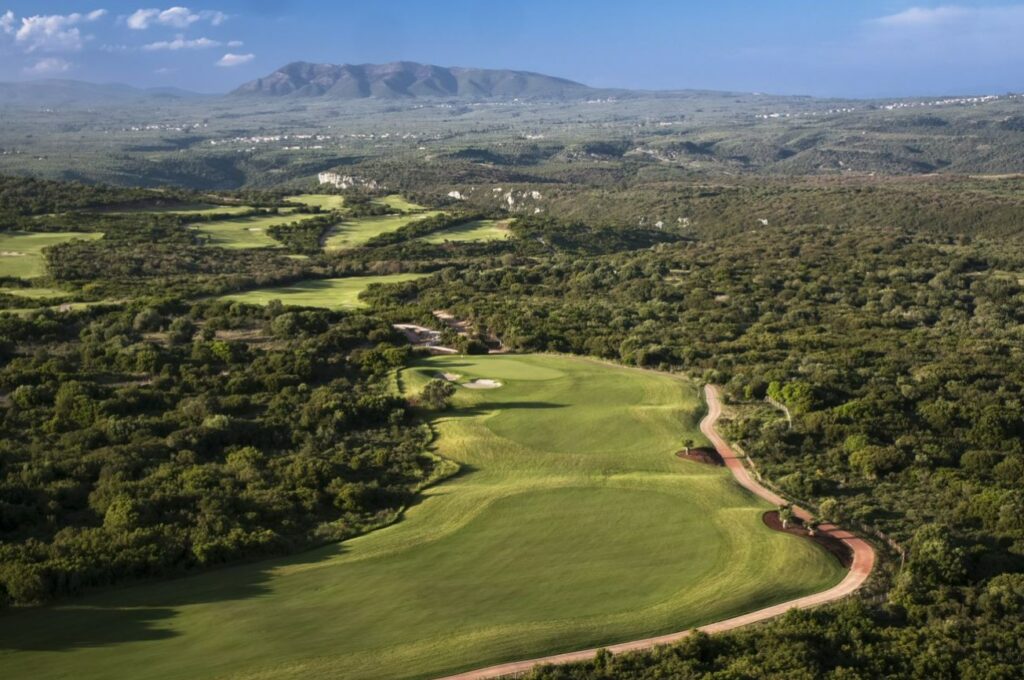 https://golftravelpeople.com/wp-content/uploads/2023/02/Costa-Navarino-Hills-Course-1-1024x680.jpg