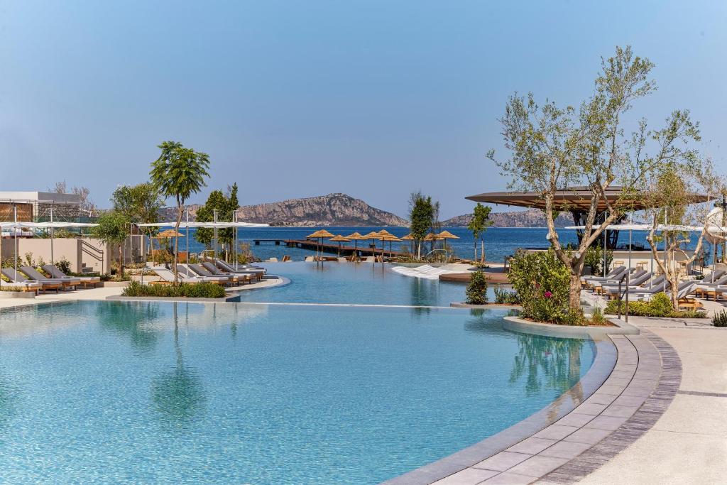 https://golftravelpeople.com/wp-content/uploads/2023/02/W-Costa-Navarino-Greece-Swimming-Pools-Leisure-Facilities-3.jpg