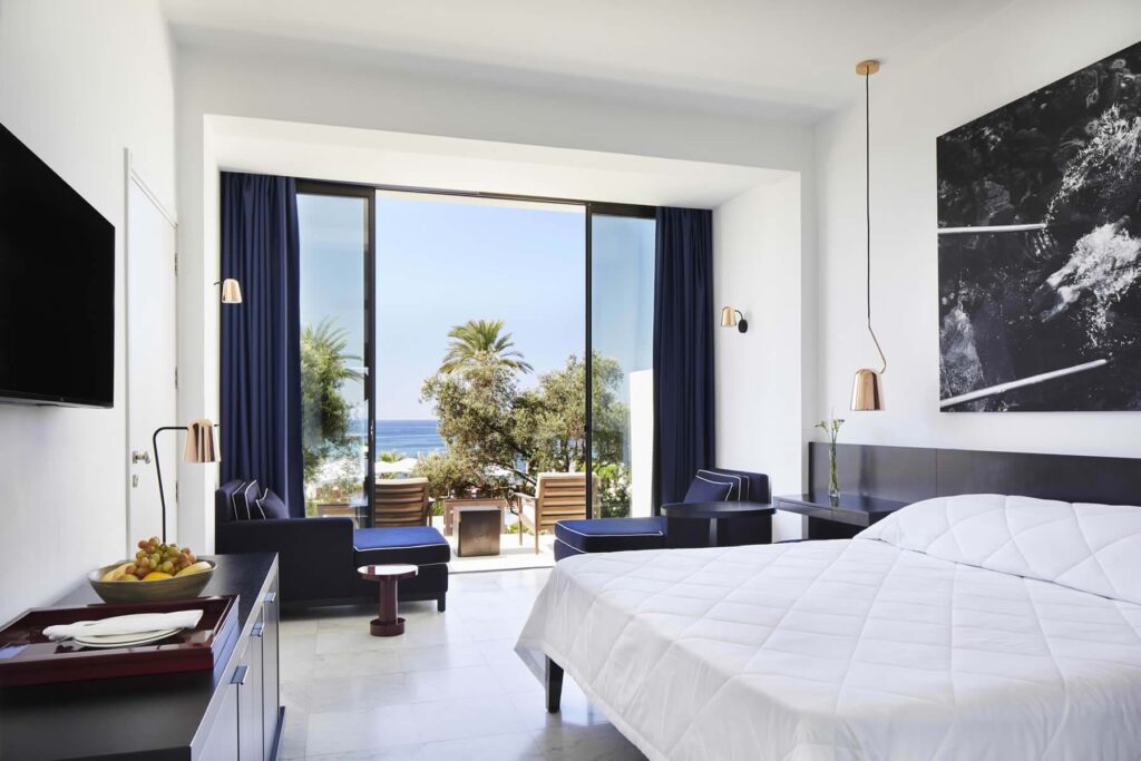 https://golftravelpeople.com/wp-content/uploads/2023/07/Almyra-Hotel-Paphos-Cyprus-Bedrooms-and-Suites-1-1024x683.jpg