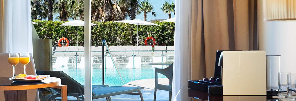 https://golftravelpeople.com/wp-content/uploads/2023/07/Elba-Costa-Ballena-Beach-and-Thalasso-Resort-Bedrooms-and-Suites-10.jpg