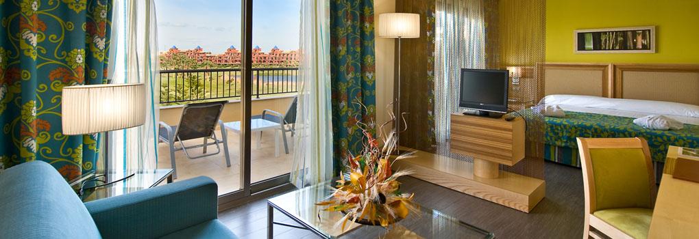 https://golftravelpeople.com/wp-content/uploads/2023/07/Elba-Costa-Ballena-Beach-and-Thalasso-Resort-Bedrooms-and-Suites-3.jpg