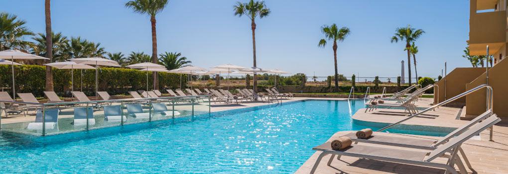 https://golftravelpeople.com/wp-content/uploads/2023/07/Elba-Costa-Ballena-Beach-and-Thalasso-Resort-Swimming-Pools-and-Leisure-Facilities-6.jpg
