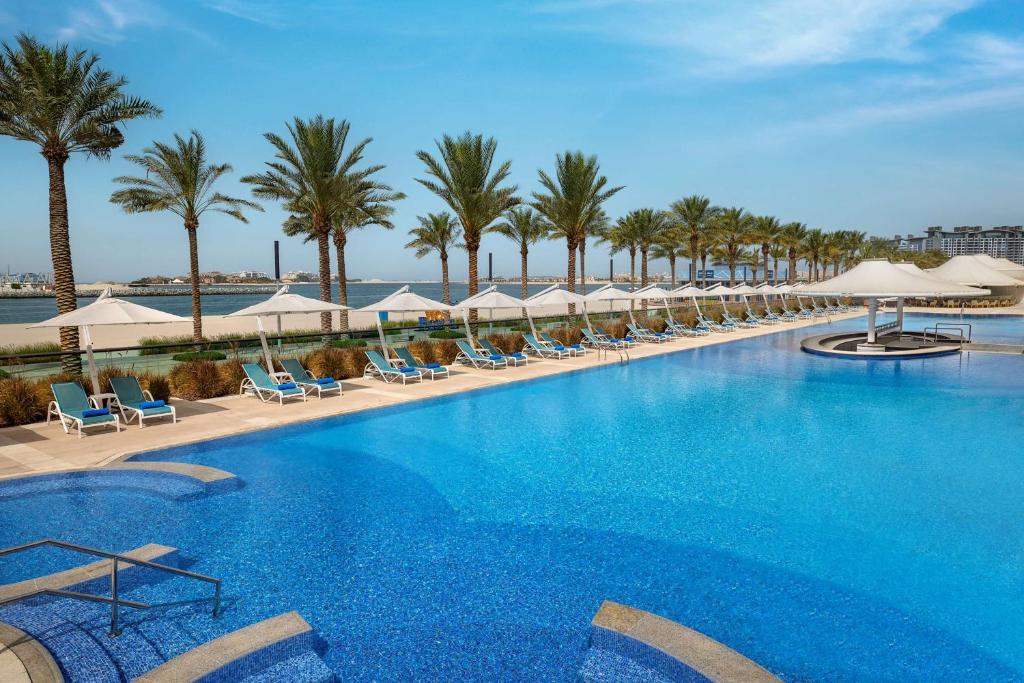 https://golftravelpeople.com/wp-content/uploads/2023/07/Hilton-Dubai-Palm-Jumeirah-14.jpg