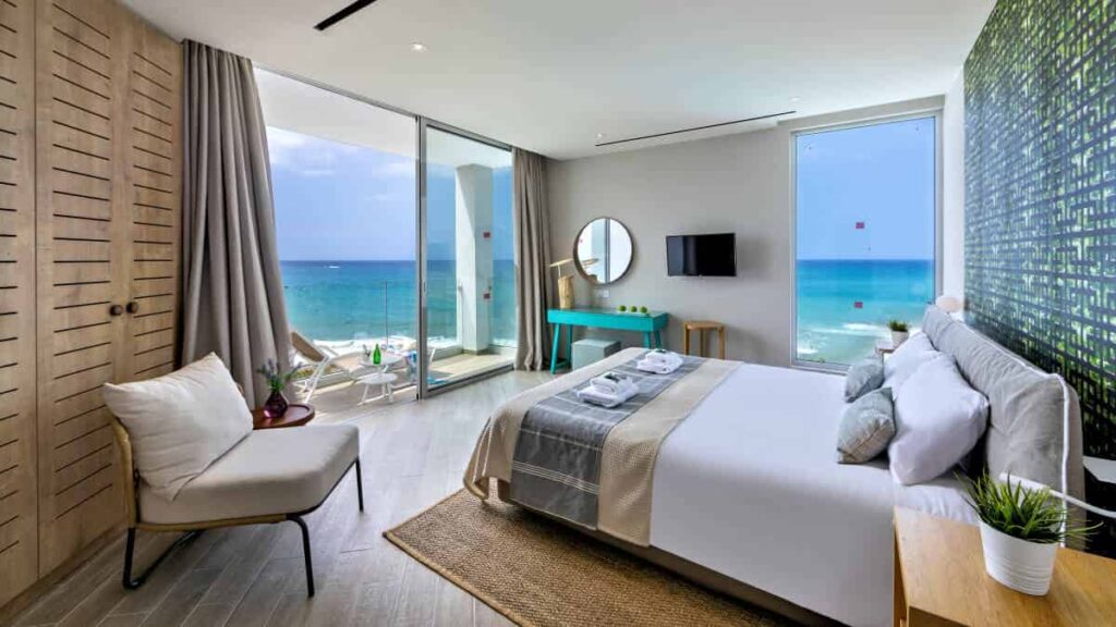 https://golftravelpeople.com/wp-content/uploads/2023/07/Leonardo-Plaza-Cypria-Maris-Beach-Paphos-Cyprus-Bedrooms-and-Suites-10-1024x576.jpg
