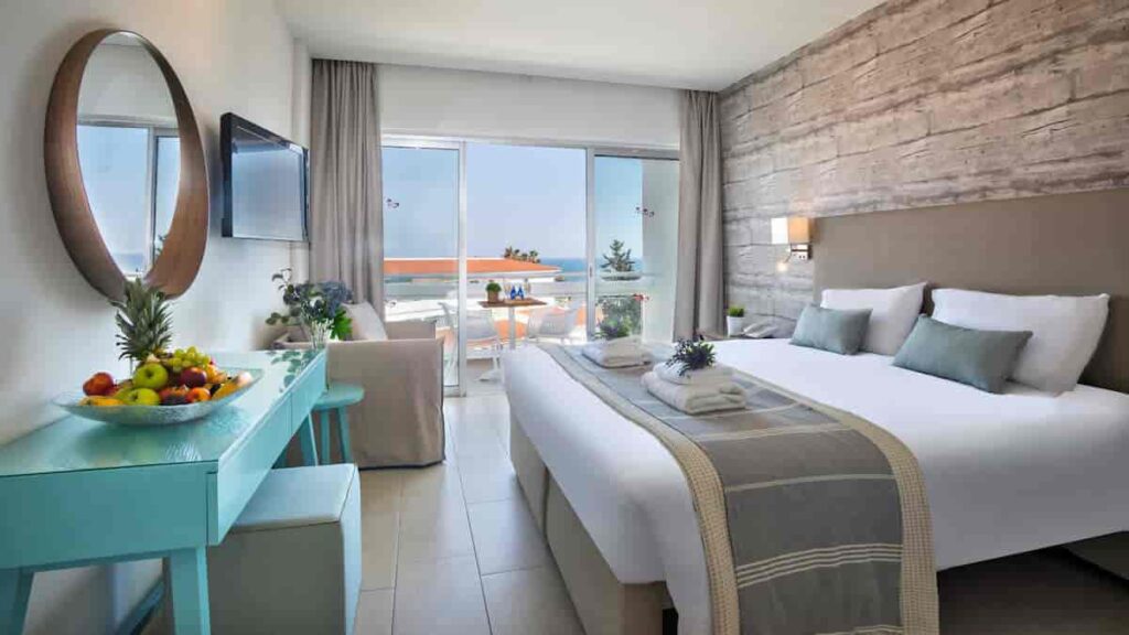 https://golftravelpeople.com/wp-content/uploads/2023/07/Leonardo-Plaza-Cypria-Maris-Beach-Paphos-Cyprus-Bedrooms-and-Suites-18-1024x576.jpg