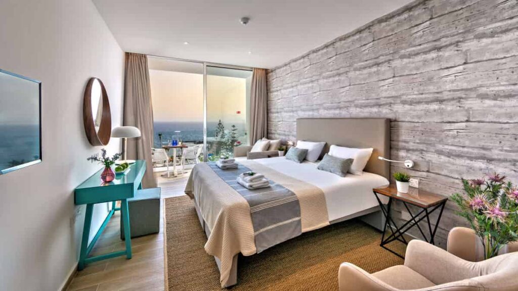 https://golftravelpeople.com/wp-content/uploads/2023/07/Leonardo-Plaza-Cypria-Maris-Beach-Paphos-Cyprus-Bedrooms-and-Suites-2-1024x576.jpg