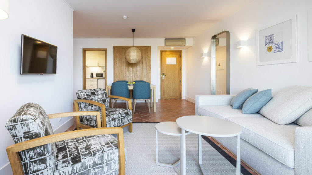 https://golftravelpeople.com/wp-content/uploads/2024/04/Patio-Suite-Hotel-Albufeira-Algarve-Portugal-Bedrooms-Apartments-Suites-10-1024x576.jpg
