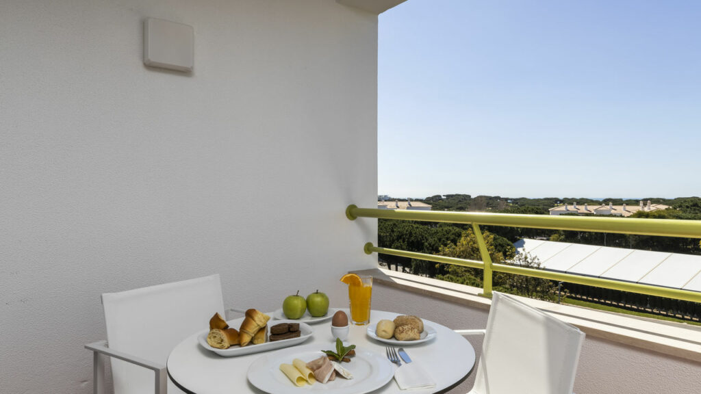 https://golftravelpeople.com/wp-content/uploads/2024/04/Patio-Suite-Hotel-Albufeira-Algarve-Portugal-Bedrooms-Apartments-Suites-15-1024x576.jpg