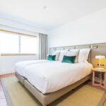 https://golftravelpeople.com/wp-content/uploads/2024/04/Patio-Suite-Hotel-Albufeira-Algarve-Portugal-Bedrooms-Apartments-Suites-21-150x150.jpg