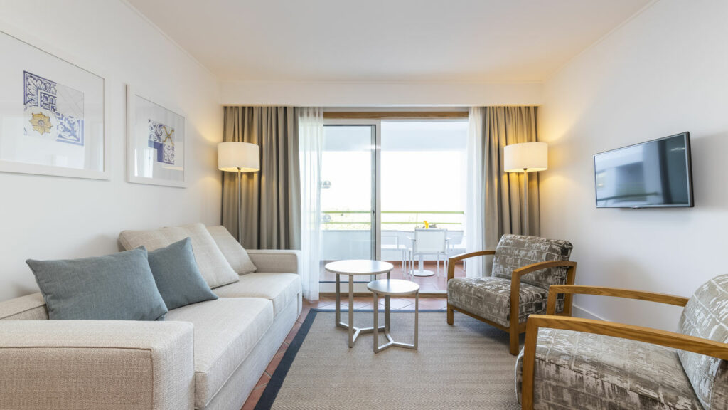 https://golftravelpeople.com/wp-content/uploads/2024/04/Patio-Suite-Hotel-Albufeira-Algarve-Portugal-Bedrooms-Apartments-Suites-5-1024x576.jpg