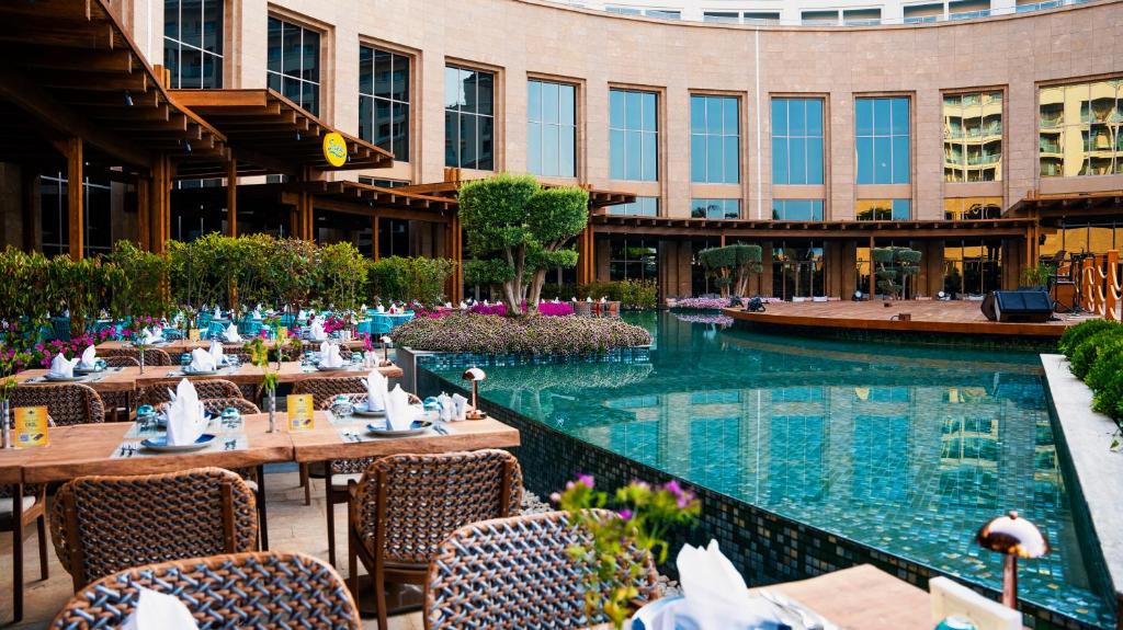 https://golftravelpeople.com/wp-content/uploads/2024/09/Kaya-Palazzo-Hotel-Belek-Restaurants-and-Bars-6.jpg