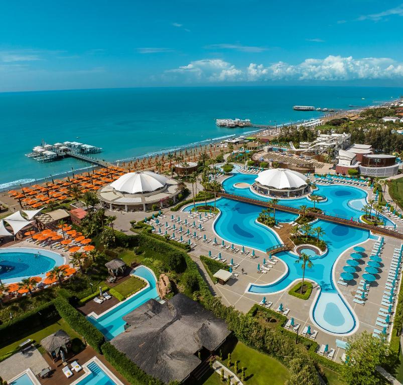 https://golftravelpeople.com/wp-content/uploads/2024/09/Kaya-Palazzo-Hotel-Belek-Swimming-Pools-and-Leisure-Facilities-6.jpg