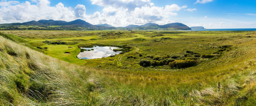 https://golftravelpeople.com/wp-content/uploads/2025/12/Ballyliffin-Golf-Course_TI72L5J-1024x424.jpg